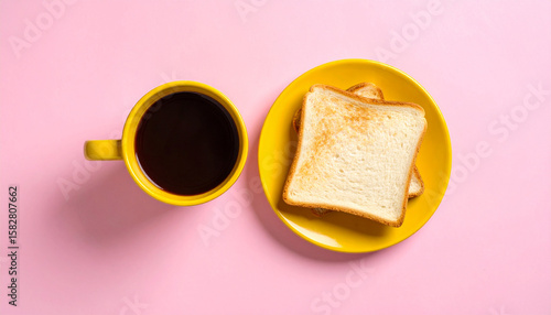 Coffee and Toast: A simple and appealing breakfast scene. A vibrant cup of dark coffee sits alongside a plate of golden, toasted bread.