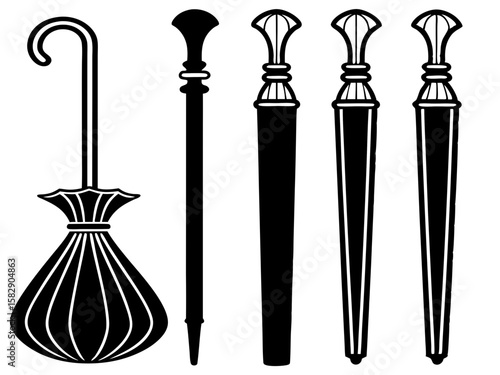 Collection of vintage walking sticks and umbrella with decorative handles