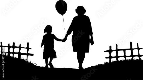 Silhouette of a child holding a balloon and holding hands with an adult on a path with a fence line