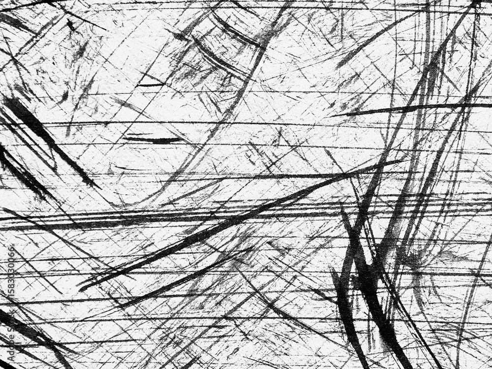 Obraz premium Abstract black and white lines create dynamic textures on a scratched surface in a minimalist style