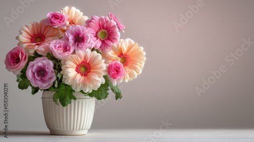 A beautiful bouquet of colorful flowers in a vase, perfect for decoration and expressing love