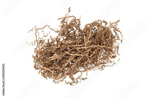 Brown box filler. Finely shredded kraft paper isolated on white background.