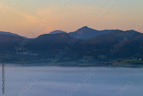 Wallpaper Mural Mountains of the La Rhune Range Emerging from a Sea of Clouds at Sunrise in Sare Torontodigital.ca