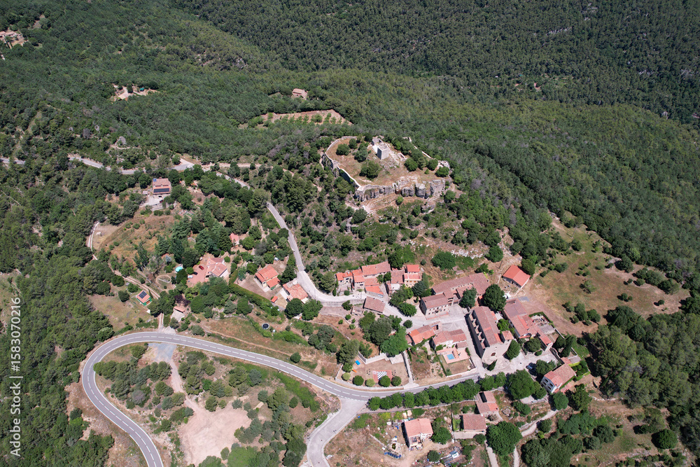Obraz premium Aerial view of l'Albiol village and the castle on sunny summer day. Tarragona, Spain.