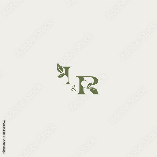 organic leaf logo bold initial concept letter luxury wedding monogram design IR