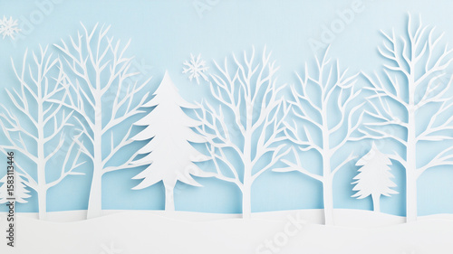 White paper cut mixed trees standing in row in winter forest, handmade blue Christmas background
