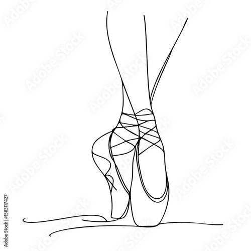 Ballet dancer's feet in pointe shoes with laces tied elegantly  