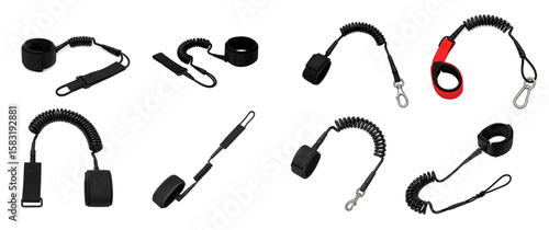 Set of coiled paddleboard safety leashes with adjustable ankle cuffs and durable tethers; each leash offers secure attachment for water sports and prevents board loss in active conditions