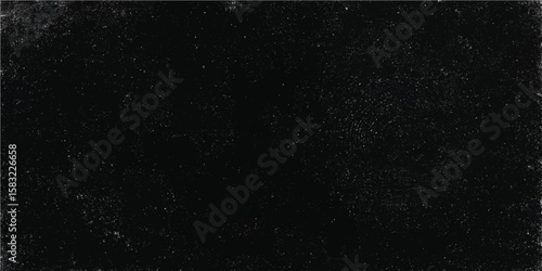 Dark grunge texture of abstract black and white space with stars, light, and a dusty sky pattern