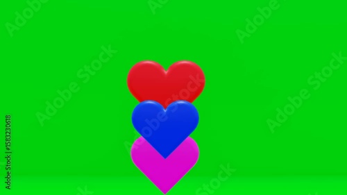 3D blue and pink hearts rotating together on green screen.