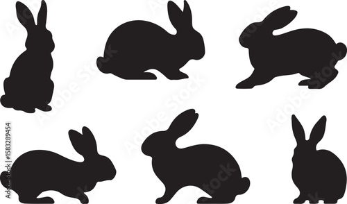 Collection of six black rabbit silhouettes in various poses silhouette
