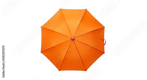 Open orange umbrella on black backdrop
