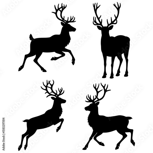 Silhouettes of four black deers
