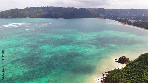 aerial view of tropical island Mandalika Beach from a far