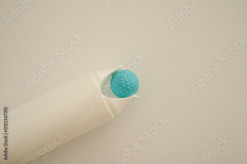Obraz na plátně Roller with rubber knop ball, to be used in combination with anti scar creme, to prevent scars from building, e