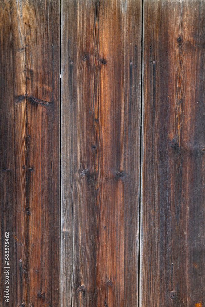 Old wooden planks creating a rustic textured background in Osturna, Slovakia Old wooden planks creating a rustic textured background in Osturna, Slovakia