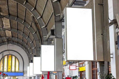 Mock up blank vertical Lcd screen in a train station