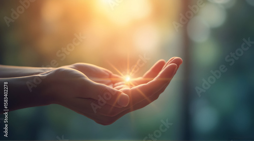 Open Hands Receiving Sunlight with Lens Flare and Soft Focus