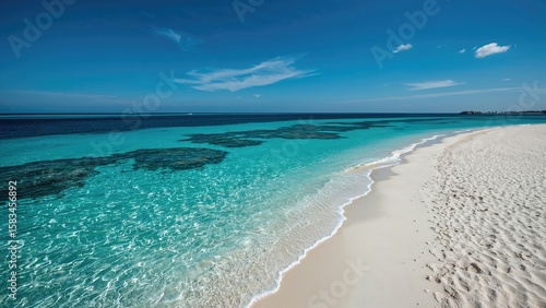 Fototapeta Naklejka Na Ścianę i Meble -  Bird's-eye perspective of turquoise waters and pristine beach
