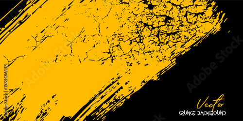 Striking yellow grunge texture with bold brush strokes on a black backdrop.