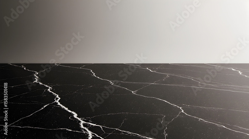 Elegant black marble stone table with white natural veins. A minimalist empty stage with a gradient background for product placement.