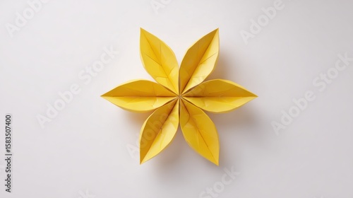Yellow origami star flower