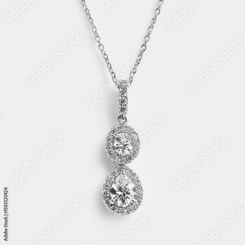 A diamond pendant with a diamond pendant