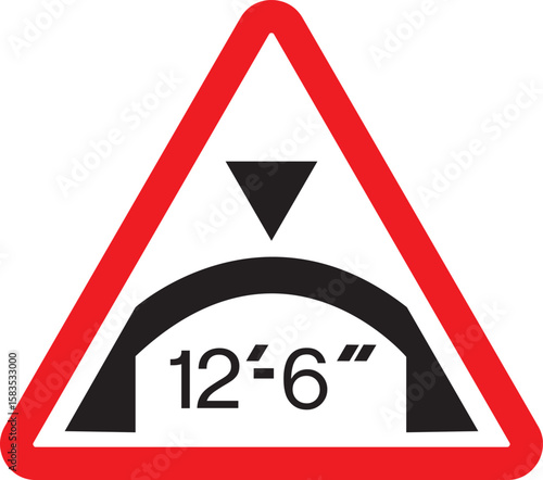Low clearance warning sign indicating 12 feet 6 inches height limit for road traffic safety