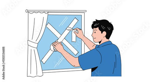 Man applying tape to window for protection against storm damage