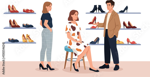 Woman tries on shoes in boutique, assisted by sales clerk
