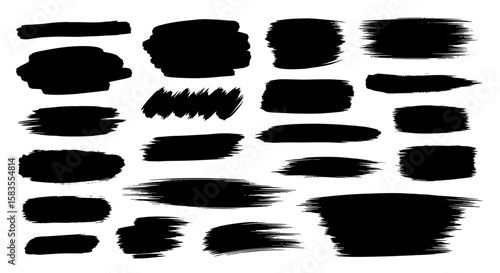 Collection of varied black brushstrokes and paint splatters with textured edges.