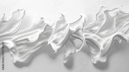 White glossy flowing shapes on a white backdrop resembling liquid in motion
