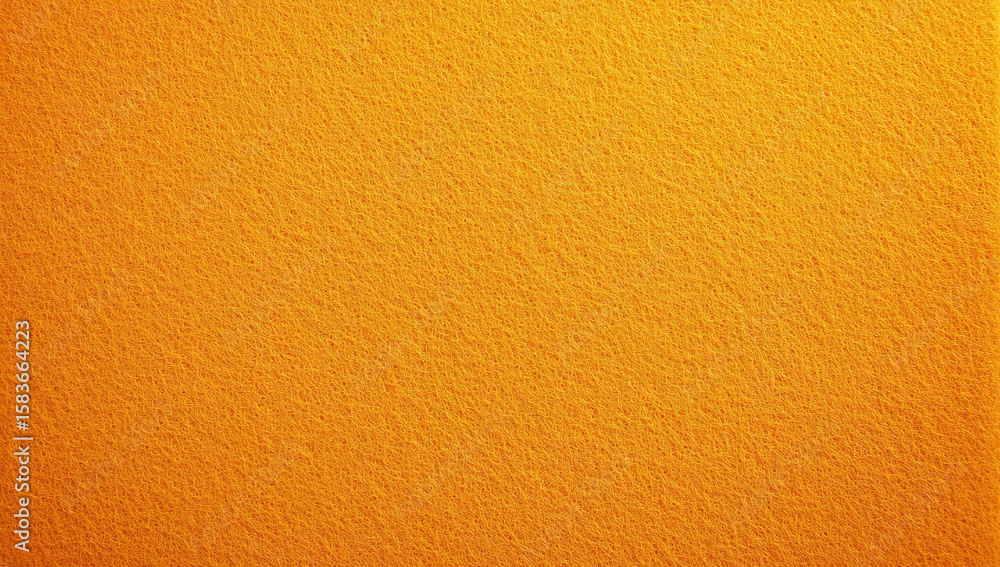 Fototapeta premium Close up view of textured bright orange felt background suitable for various design purposes.