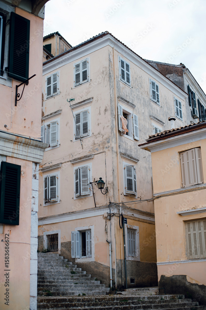 Fototapeta premium Charming European Building with Shuttered Windows