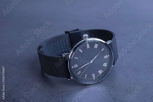 Wrist watch for women on gray background