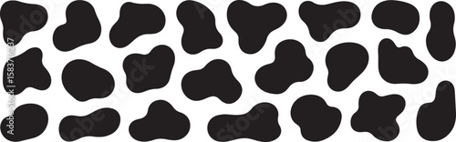 Abstract black cow spots pattern isolated on a white background for design elements