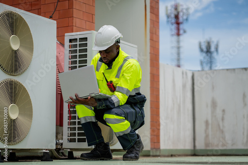 Engineers is checking the air conditioning cooling system of a major building or industrial facility.