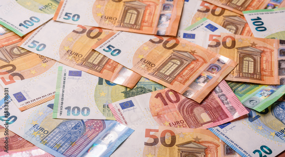 Paper money, euro notes, cash for savings and investments. Euro paper cash Paper money, euro notes, cash for savings and investments. Euro paper cash