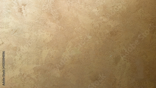 Obraz na plátně Metallic gold venetian plaster wall background, seamless stucco texture with elegant shine, rich decorative finish for interior, digital design, posters, and product display