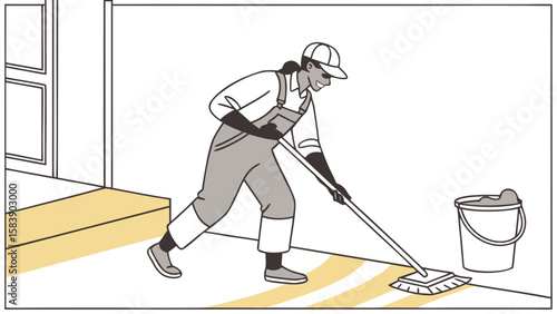 Person in overalls and cap mopping a floor with a bucket nearby