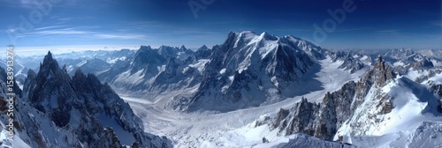 Panoramic View of Mont Blanc: Adventure Awaits at Aiguille du Midi with Majestic Alpine Landscape and Clear Blue Skies