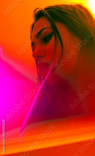 Dreamy Portrait in Orange-Pink Glow
