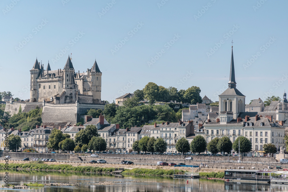 Obraz premium Peaceful Cityscape of Saumur, Beautiful Historic Town in the Loire Valley, France, Wallpaper