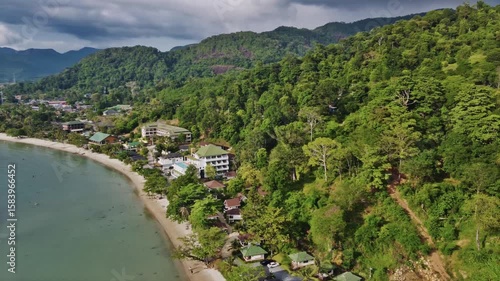 Drone view of amazing Kai Bae beach blending with turquoise waters, palm trees