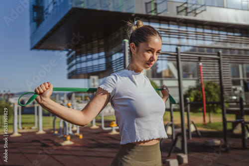 beautiful caucasian adult sports woman stretching at outdoor gym Free Download beautiful caucasian adult sports woman stretching at outdoor gym - GFXLoad
