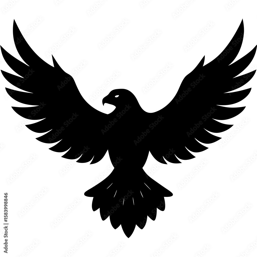 Obraz premium Powerful black silhouette of an eagle with wings spread wide