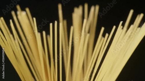 Wallpaper Mural Uncooked Spaghetti Stands Tall Against Black Backdrop Food Presentation Torontodigital.ca