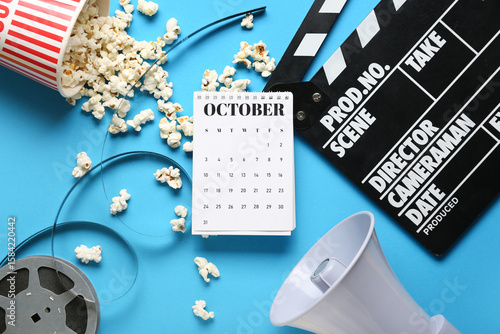 Calendar with movie clapper...