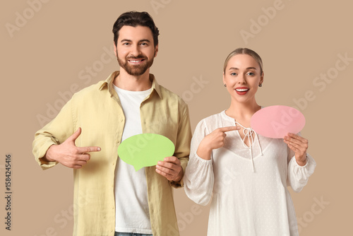 Young couple with blank spe...