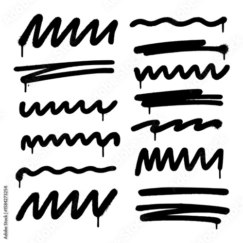 Collection of black spray paint graffiti marks with drips and rough texture